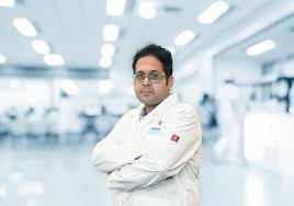 Dr Arjun Ray